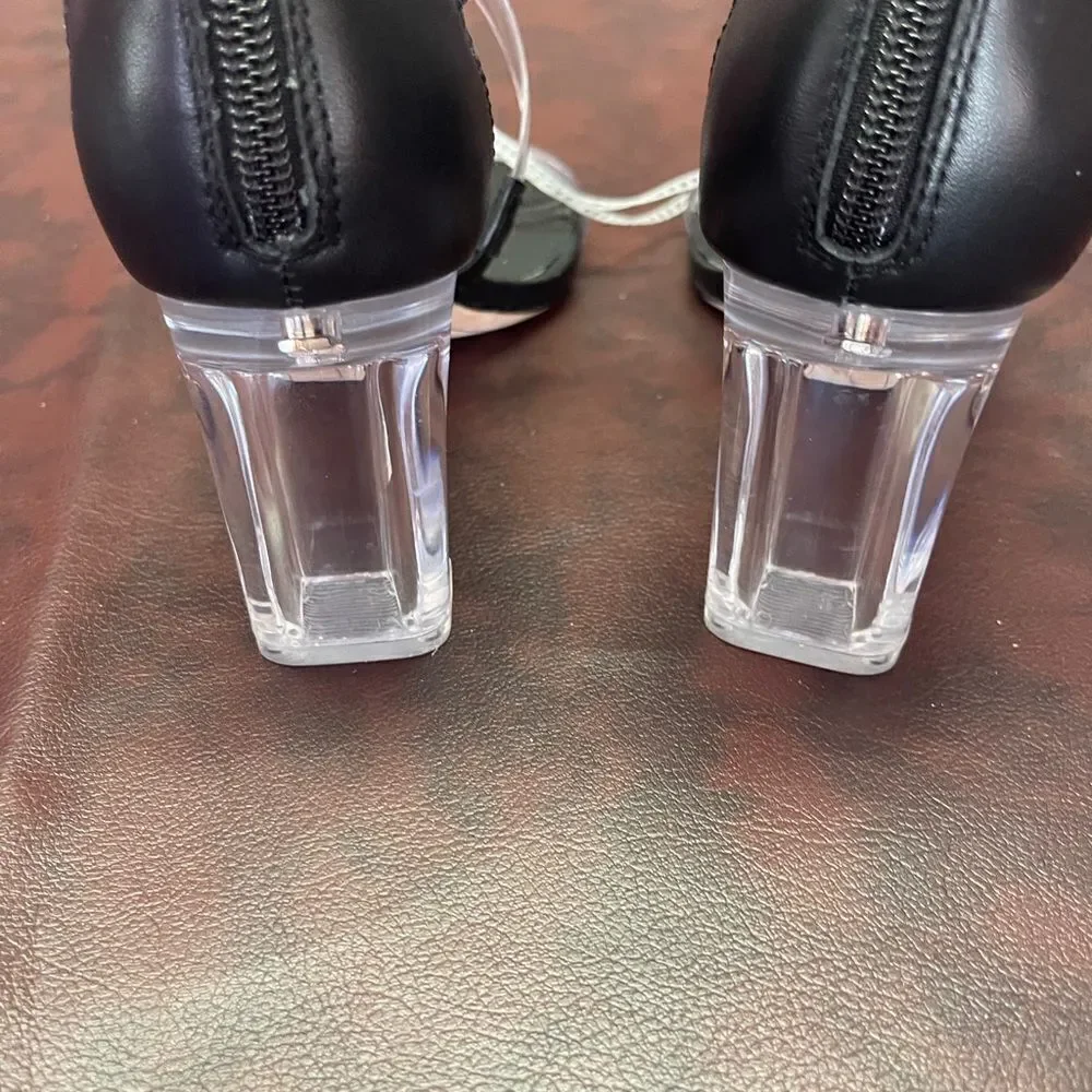 Deltan clear and‎ black heels new without tags, size 6.5